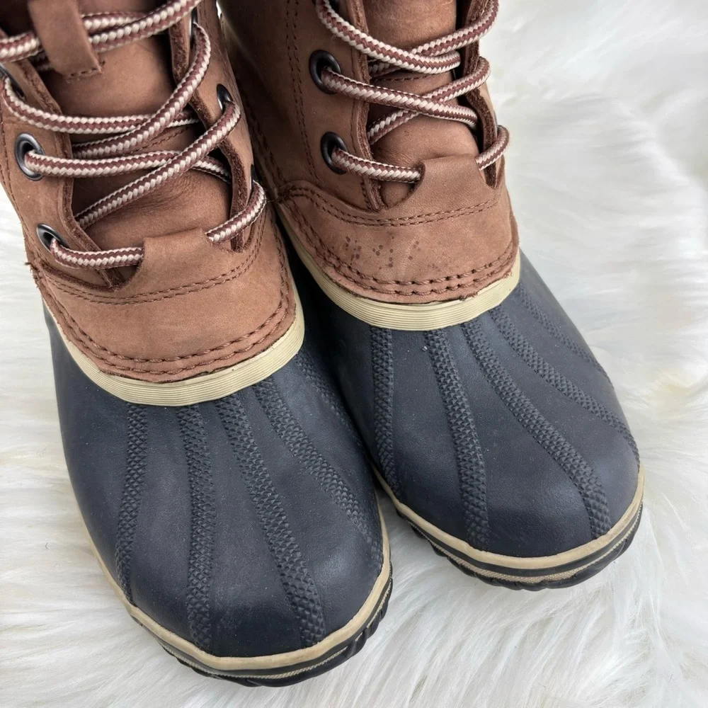 Sorel Tan and Black Lace-Up Boots